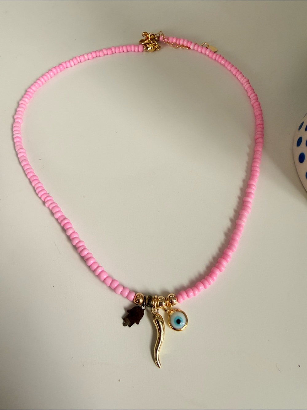 Pink Beaded Charm Necklace with Gold Hamsa, Horn & Evil Eye